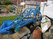The chassis of the original M2 on a scrap pile