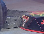 Matilda's chainsaw cut through SAT'arn easily, but locked up as soon as it touched The Demolisher