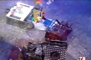 Drillzilla pushes Conquering Clown against Red Virus