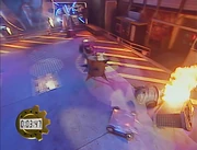 King Buxton and Matilda push RoboDoc onto the Flame Pit