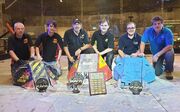 Shane Lale and Gilbert Grimm with Iron-Awe 6 and its UK Championship trophy