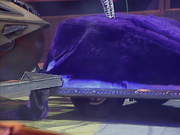 Dead Metal attacks Purple Predator from behind