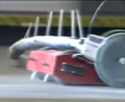 Red 2 rams Bob Smith from behind