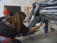 Spray paint is applied to The Sentinel's arm
