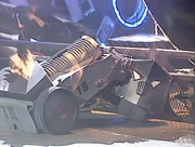 T 2 rams The Darke Destroyer into the side wall