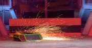 Carbide immobilises Ironside3 in a shower of sparks