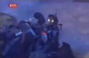 Growler drives into Refbot whilst pushing Slamtilt