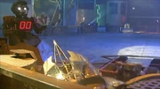 Tornado frees Razer from the angle grinder whilst Refbot watches on