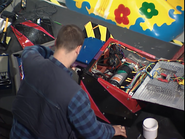 Wolverine S3 Pits.png (1.24 MB) An overhead shot of Wolverine being worked on in The Pits during Series 3