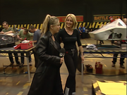 A damaged Berserk 2 appears in the background of Philippa Forrester and Julia Reed's introduction to Series 4