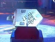 Steel Avenger is thrown onto its side by Trax