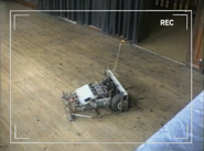 A partially-finished Sting is tested in a church hall, in a clip from the team's video diary shown in Robot Wars Revealed