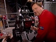 Refbot with Swedish presenter Micke Dubois, in a sketch shown as part of the Swedish dub of Heat D of Series 4