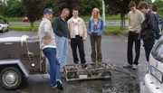 Michael Schmidt (far left) showing Pegasus to other German roboteers at the auditions.
