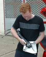 Phil Duncanson holding Agent Orange's claw at the Series 3 audition