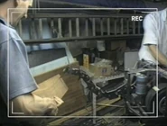 Sting's 'tail' chips a titanium sheet, in a clip from the team's video diary shown in Robot Wars Revealed