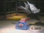 M2 flipping Chaos 2 at a live event in 2002