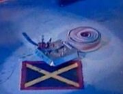 The Revolutionist rips off Propeller-Head's blade