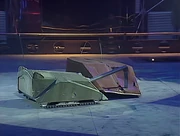 Mortis attacks Gravedigger before its track stops