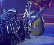 Sir Killalot lifts Binky into the air