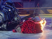 Diotoir attacks Sir Killalot while on fire