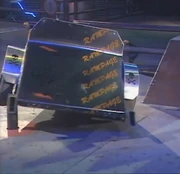 Rampage is lifted up by an arena spike