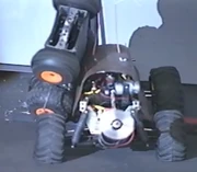 Spiked Master and Piranhabot lock together