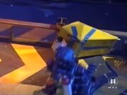 Refbot tips Tyke down from the wall