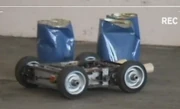 King Buxton attacks barrels in the obstacle course, in video diary footage aired as part of 