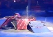 Black Hole throws sparks from the side of its opponent