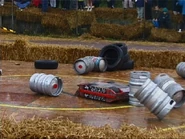 Tornado knocks down barrels and tyres during a live event