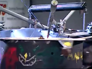 Mauler "decapitates" Mash-N-Go's decorative head