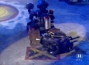 Refbot pushes Junkyard Queen onto the Drop Zone