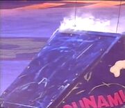 Smoke pours from the top of Tsunami