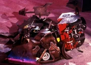 Scrapper is attacked by the House Robots, a moment not shown on television