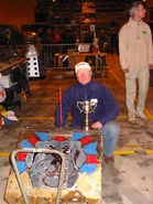 Bulldog Breed and Tony Somerfield with a trophy