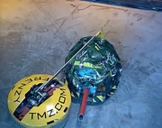 frenZy smashes the shell of Detonator as it pushes Detonator against the wall