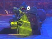 Cassius Chrome finishes off Scraptosaur