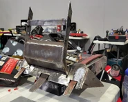 Drivetrain's front-hinged lifter