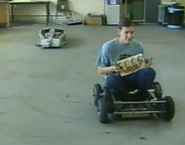 The 'race' between a partially-complete Leighviathan and Leighbot, in a clip from their video diary shown on Robot Wars Revealed