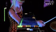 Heather Moonbeam in the Wii version of Rock Band 2 (NOTE: She has the Tomboy face instead of the Rebel face).