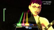 Dora playing bass in Rock Band 2.