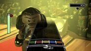 Buzzsaw singing in Lego Rock Band.