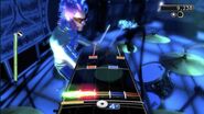 The Duke of Gravity playing drums.