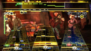 Moosejaw Boudreau and Ol' Smokey with two other characters in Rock Band Country Track Pack.