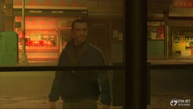 Niko ordering the China shop owner to hand over Vlad's protection money.