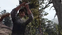 Jack skins an elk.