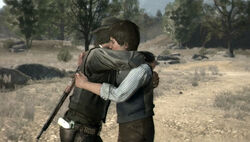 John hugs Jack before the assault on the ranch.