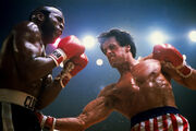 Rocky ducking a hook from Lang
