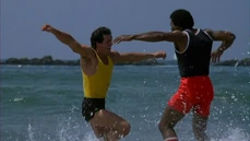 Rocky and Apollo celebrating Rocky getting his Eye of the Tiger back.